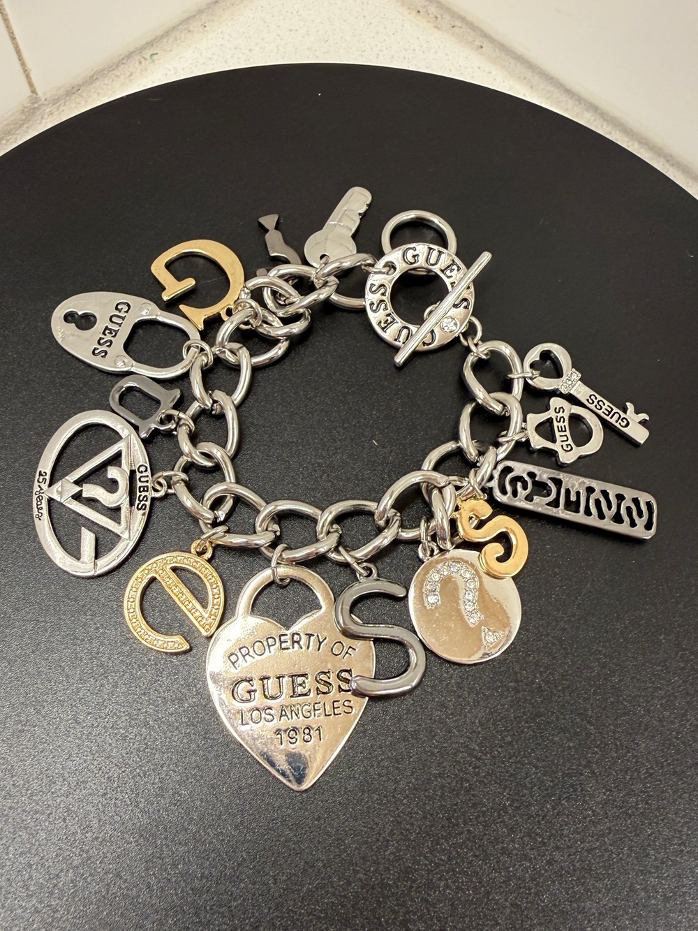 GUESS Two-Tone Silver and Gold Charm Bracelet